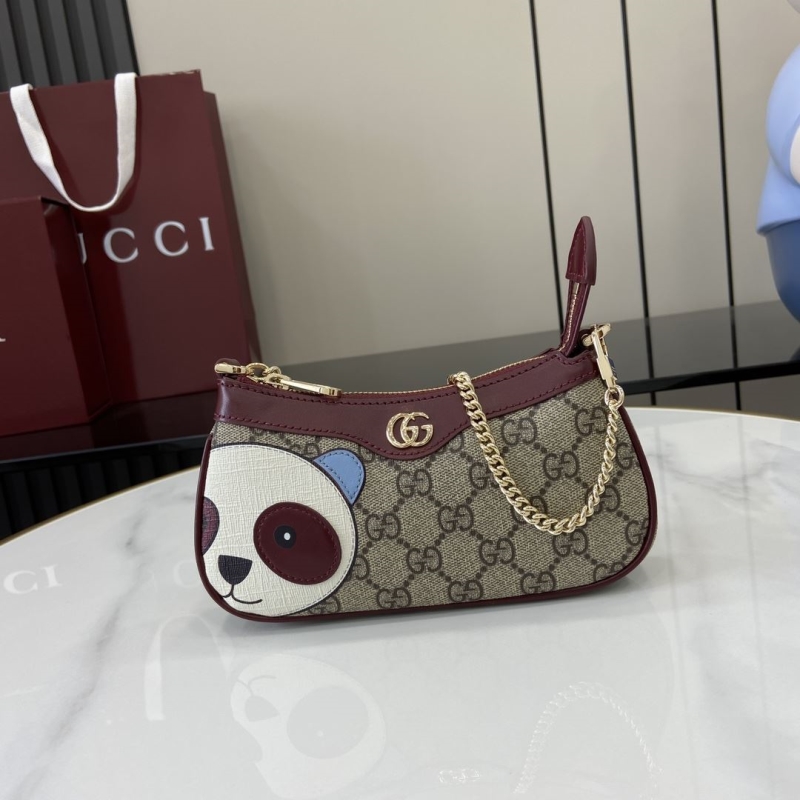 G*u*i top handle bags